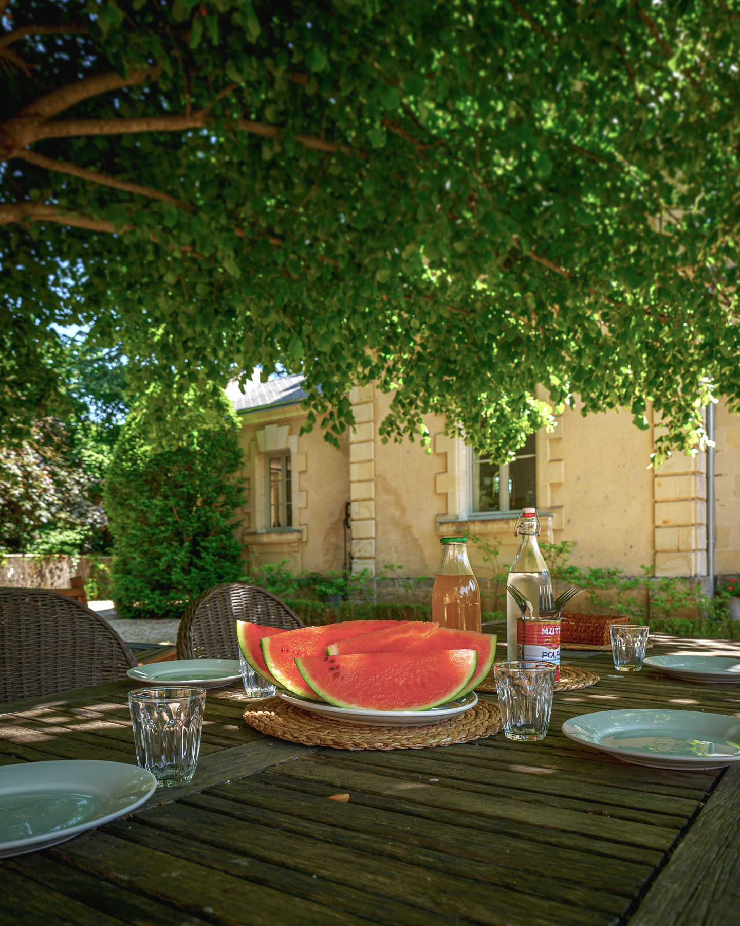Melon on table in courtyard at Chateau de la Vigne