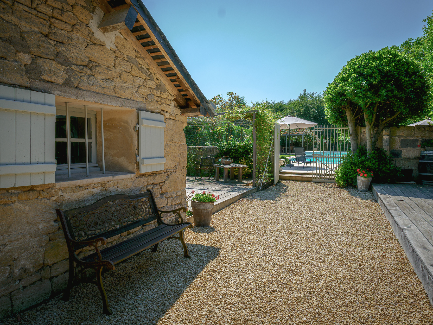 Terrace leading to the swimming pool at Chateau de la Vigne