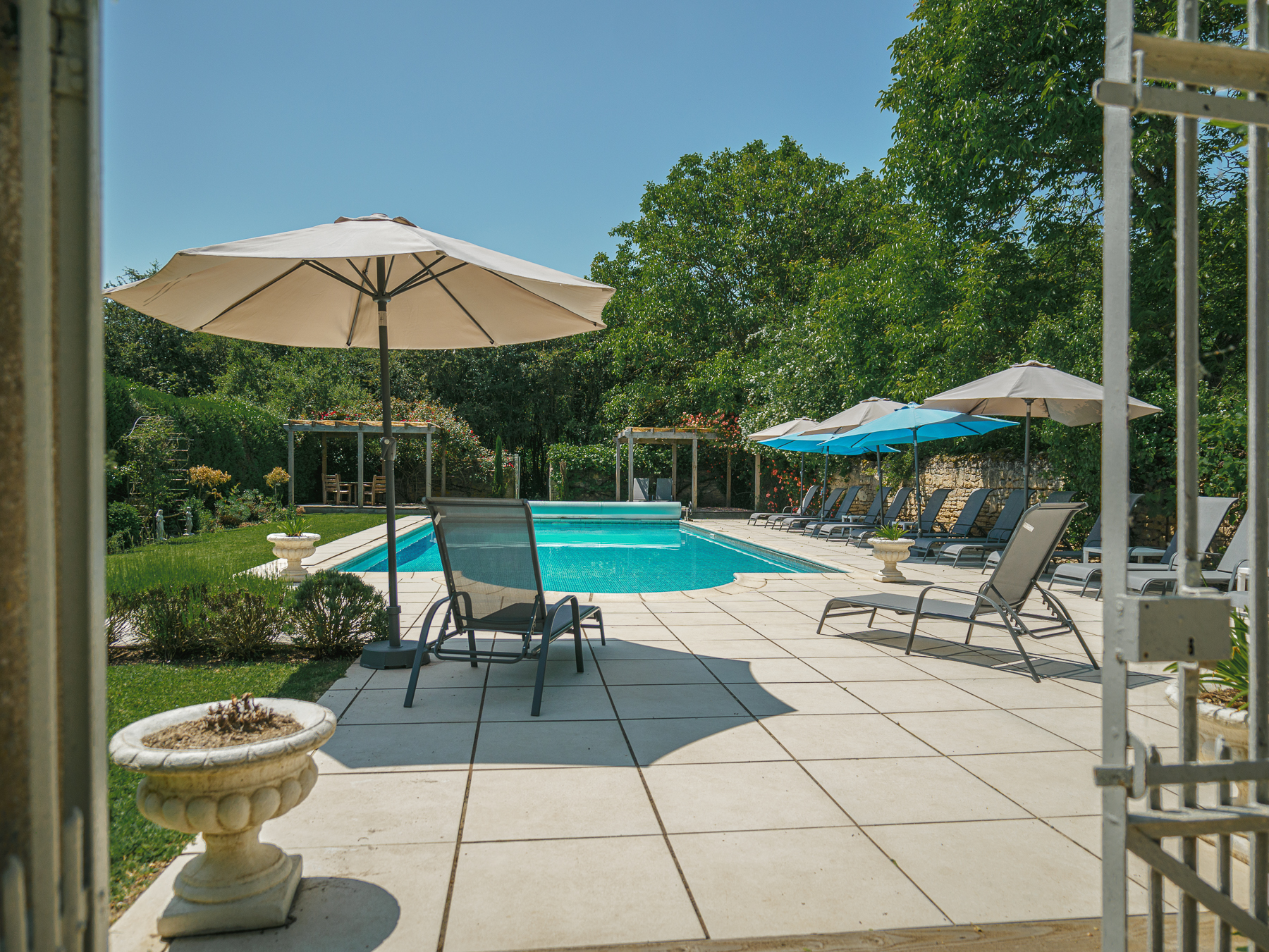 Pool view from gates at chateau de la vigne