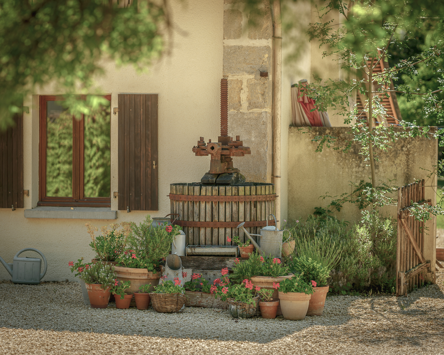Wine press in courtyard at Chateau de la Vigne